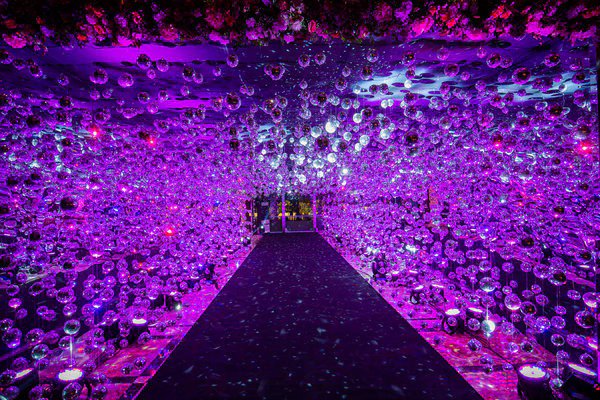 A glowing purple floral entrance