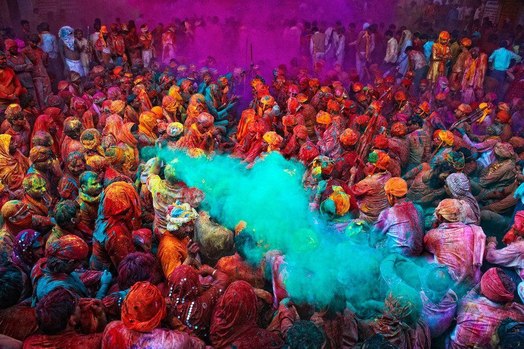Holi celebrations in clouds of colourful gulal